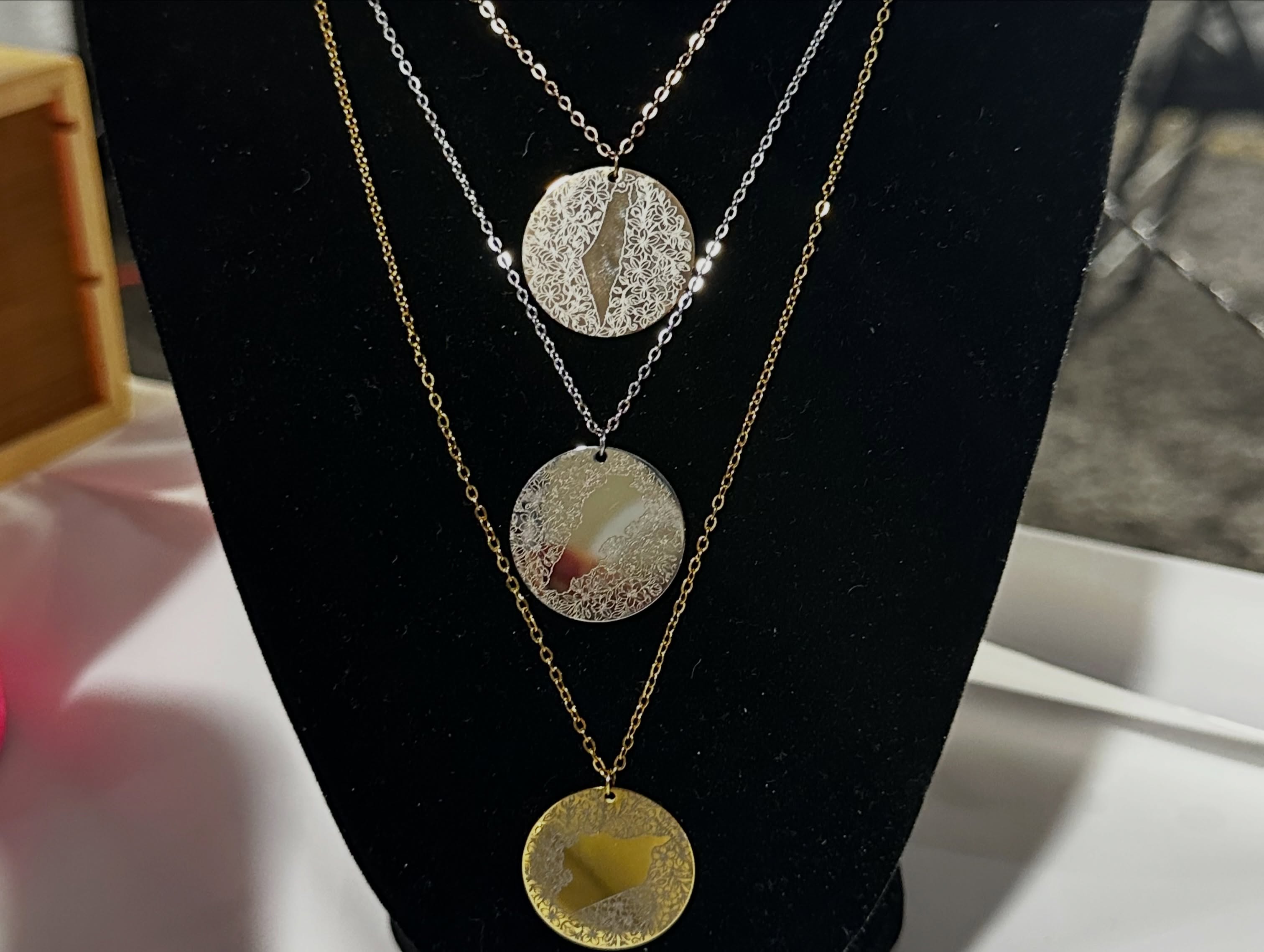 Map pendant necklaces